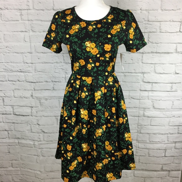 black dress with yellow roses